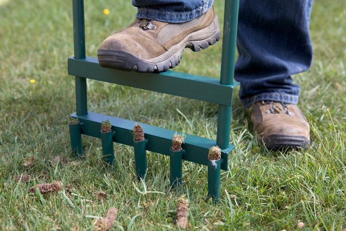 using-a-hollow-tine-aerator-2 Aerating the lawn